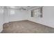 Spacious bedroom with carpet flooring, neutral walls, and a ceiling fan at 8529 Gold Flash Ave, Las Vegas, NV 89129