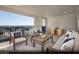 Relaxing covered deck with comfortable seating, an outdoor kitchen and great views at 8683 Luxuriant Ave # Lot 26, Las Vegas, NV 89148