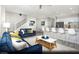 Open concept living room and kitchen with modern decor and plenty of natural light at 8683 Luxuriant Ave # Lot 26, Las Vegas, NV 89148