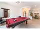 Spacious game room with a pool table and plenty of seating at 8824 Killians Greens Dr, Las Vegas, NV 89131