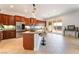 Kitchen with stainless steel appliances, granite countertops, and island with a sink at 8824 Killians Greens Dr, Las Vegas, NV 89131