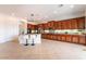 Spacious kitchen with stainless steel appliances, granite countertops, and an island with seating at 8824 Killians Greens Dr, Las Vegas, NV 89131
