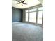 Bright and airy bedroom with large windows and soft carpeting at 8925 W Flamingo Rd # 319, Las Vegas, NV 89147