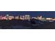 Nighttime view of the Las Vegas city skyline illuminated against the dark sky at 8925 W Flamingo Rd # 319, Las Vegas, NV 89147