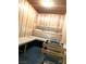 Wood sauna with built-in benches and a heater with sauna rocks at 8925 W Flamingo Rd # 319, Las Vegas, NV 89147