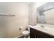 A well-lit bathroom featuring a single sink vanity and a shower and tub combination at 9050 W Tropicana Ave # 1017, Las Vegas, NV 89147