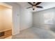 An airy bedroom with a ceiling fan and access to a private bathroom at 9050 W Tropicana Ave # 1017, Las Vegas, NV 89147