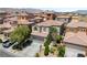 An aerial view showcasing the property among other neighborhood homes in the surrounding area at 9074 Iron Cactus Ave, Las Vegas, NV 89148