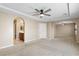 Large bedroom with archways to an ensuite bathroom and another room at 9074 Iron Cactus Ave, Las Vegas, NV 89148