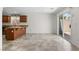 Bright dining area with tile flooring and sliding glass door to the backyard at 9074 Iron Cactus Ave, Las Vegas, NV 89148