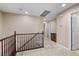 Hallway upstairs with access to rooms and closets at 9074 Iron Cactus Ave, Las Vegas, NV 89148
