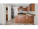Well-equipped kitchen features stainless steel appliances and stone countertops at 9074 Iron Cactus Ave, Las Vegas, NV 89148