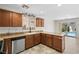 Well-lit kitchen area overlooking the backyard swimming pool at 9074 Iron Cactus Ave, Las Vegas, NV 89148