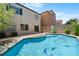 Inviting backyard pool and patio area are ideal for relaxation and enjoyment of the outdoors at 9074 Iron Cactus Ave, Las Vegas, NV 89148