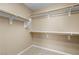 A well-organized walk-in closet featuring ample shelving and rod space at 9074 Iron Cactus Ave, Las Vegas, NV 89148