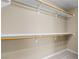 A well-organized walk-in closet featuring ample shelving and rod space at 9074 Iron Cactus Ave, Las Vegas, NV 89148