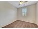 Neutral bedroom with carpet flooring, a ceiling fan, and shuttered windows, offering a relaxing space at 9542 Ridgeglen Ct, Las Vegas, NV 89148