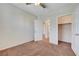 Inviting bedroom with carpet, an open closet and a ceiling fan, ready for your personal touch at 9542 Ridgeglen Ct, Las Vegas, NV 89148