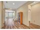 Bright entryway features hardwood floors and seamless transition into a living area at 9542 Ridgeglen Ct, Las Vegas, NV 89148