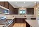 Modern kitchen with stainless steel appliances and bright countertops at 9542 Ridgeglen Ct, Las Vegas, NV 89148