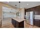Bright kitchen with an island and open floor plan at 9542 Ridgeglen Ct, Las Vegas, NV 89148