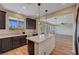 Well-lit kitchen with a view to the backyard at 9542 Ridgeglen Ct, Las Vegas, NV 89148