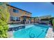 An inviting private pool and spa provide a tranquil retreat in the backyard at 9542 Ridgeglen Ct, Las Vegas, NV 89148
