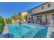 Backyard features a private pool, spa, and covered patio perfect for relaxation at 9542 Ridgeglen Ct, Las Vegas, NV 89148