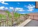 Balcony featuring iron railing with landscape views at 96 Saint Johns Wood Ave, Henderson, NV 89002