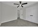Bedroom featuring carpet, ceiling fan, and closet at 96 Saint Johns Wood Ave, Henderson, NV 89002