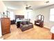 Spacious main bedroom featuring carpet floors, ceiling fan and a private sitting area at , Las Vegas, NV 89179