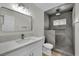 This renovated bathroom features a modern vanity and an updated stand-up shower at 101 N 19Th St, Las Vegas, NV 89101