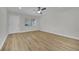 Bright bedroom with new flooring features natural light and a ceiling fan at 101 N 19Th St, Las Vegas, NV 89101