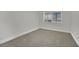 Cozy bedroom with neutral carpet and lots of natural light from the window at 101 N 19Th St, Las Vegas, NV 89101