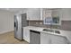 Renovated kitchen featuring stainless steel appliances and white cabinets at 101 N 19Th St, Las Vegas, NV 89101