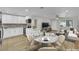 Open concept kitchen and living room area with stainless steel appliances and modern finishes at 101 N 19Th St, Las Vegas, NV 89101