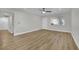 A spacious living room with natural light, features recessed lighting and modern wood-look flooring at 101 N 19Th St, Las Vegas, NV 89101