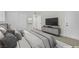 This staged bedroom features a comfortable bed and lots of storage with mirrored closet doors at 101 N 19Th St, Las Vegas, NV 89101