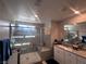 Modern bathroom featuring glass-enclosed shower, sleek vanity, and ample counter space; a functional and stylish retreat at 10163 Kings Amethyst St, Las Vegas, NV 89141