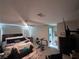 Spacious main bedroom with a ceiling fan and natural light perfect for relaxing or working out at home at 10163 Kings Amethyst St, Las Vegas, NV 89141