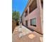 Private backyard with a brick patio and low-maintenance landscaping at 1169 Via Piazza, Henderson, NV 89052