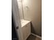 Cozy half bathroom featuring a modern vanity with chrome hardware and a framed mirror at 1480 Hialeah Dr # B, Las Vegas, NV 89119
