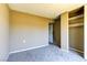 Upstairs bedroom with carpet and open closet space to the right of the door for storage at 1480 Hialeah Dr # B, Las Vegas, NV 89119