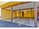 Carport area featuring marked parking spaces and stairs leading to a unit at 1480 Hialeah Dr # B, Las Vegas, NV 89119