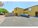 Assigned uncovered parking area with parking spot numbers and access to buildings at 1480 Hialeah Dr # B, Las Vegas, NV 89119