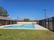 Community pool area offers a refreshing escape with green grass and lounge seating at 1480 Hialeah Dr # B, Las Vegas, NV 89119