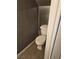 This small toilet is well kept and has neutral colored walls and tile flooring at 1480 Hialeah Dr # B, Las Vegas, NV 89119