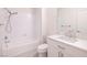 Functional bathroom featuring a shower-tub combo, tile flooring and a modern vanity with quartz countertops at 1705 King James St # 203, Las Vegas, NV 89144