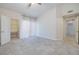 Spacious bedroom featuring plush carpet flooring, walk-in closet, ceiling fan and bright, neutral walls at 1705 King James St # 203, Las Vegas, NV 89144