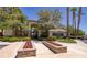 Carlisle clubhouse at Summerlin with colorful flower boxes and manicured landscaping at 1705 King James St # 203, Las Vegas, NV 89144